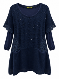 Front of Sugar Crisp navy layered knit tunic with sequin accents, floral lace panels, two pockets and long solid navy inner sleeves.